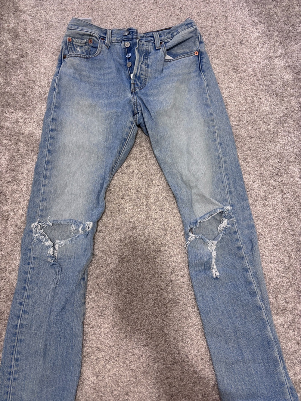 Levi's Light Blue Distressed Skinny Jeans with Knee Rips